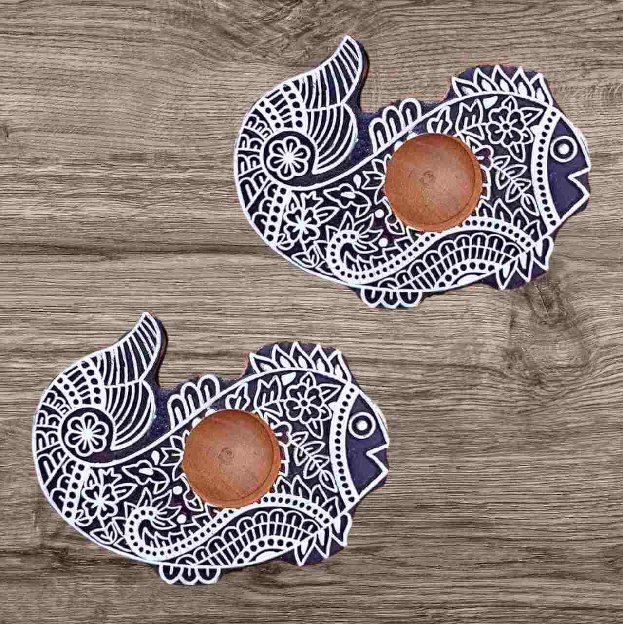 Elegant handmade Fish tealight candle holder perfect for creating a warm and cozy ambiance. Crafted with care, ideal for home décor, weddings, or gifts.