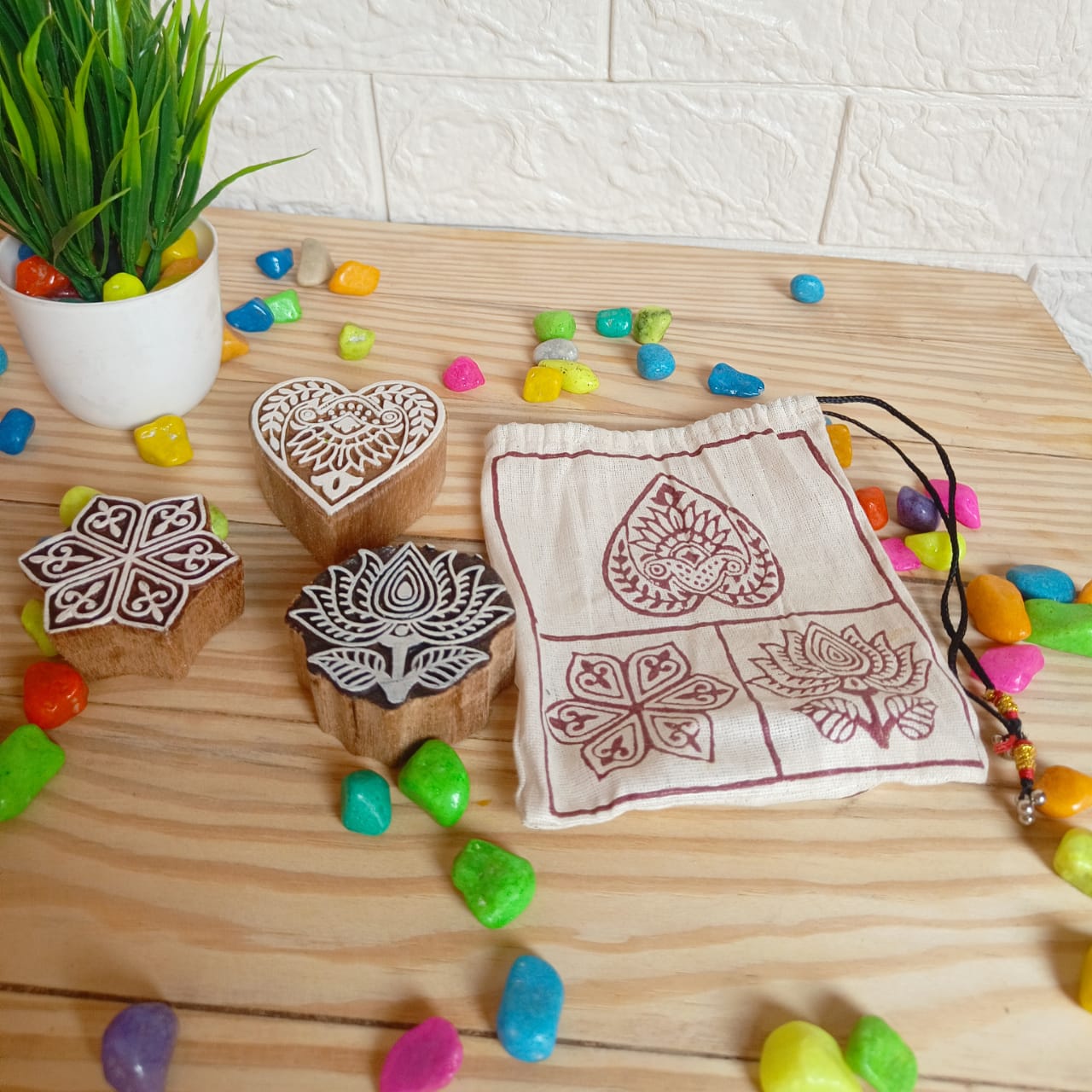 Wooden block printing stamps are commonly used in textile printing, such as for sari or tablecloth prints, but also in the production of greeting cards, wrapping paper, and other decorative items.