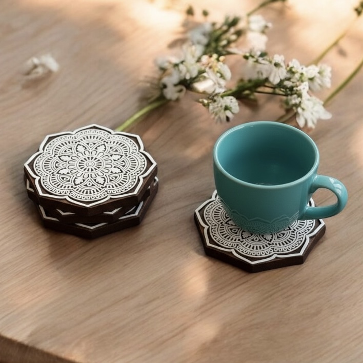 Discover beautifully crafted Wooden rangoli design tea coasters perfect for protecting surfaces and adding a touch of elegance to your table.
