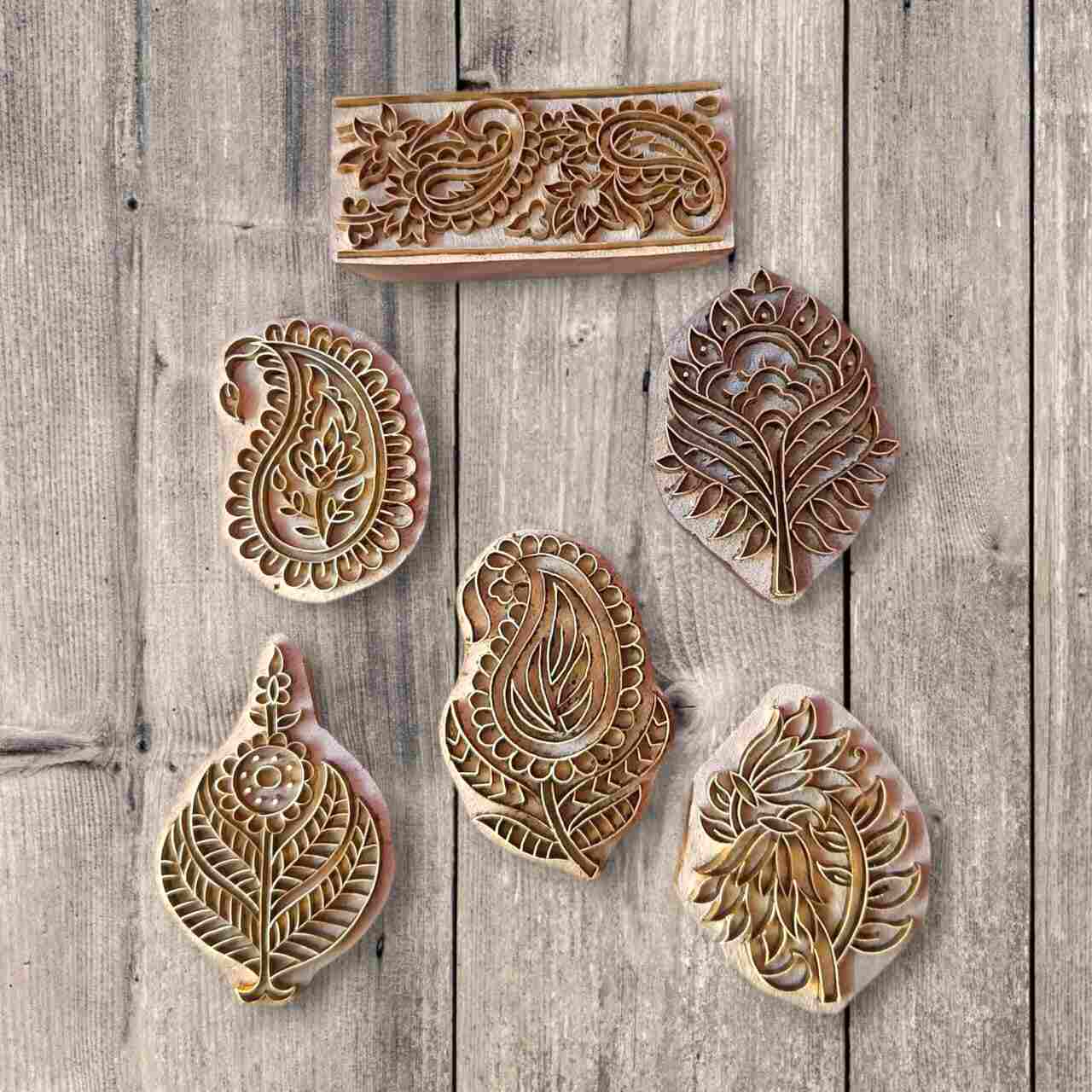 A Floral brass printing block stamps is a meticulously handcrafted tool, traditionally used in textile printing, pottery, or paper crafting