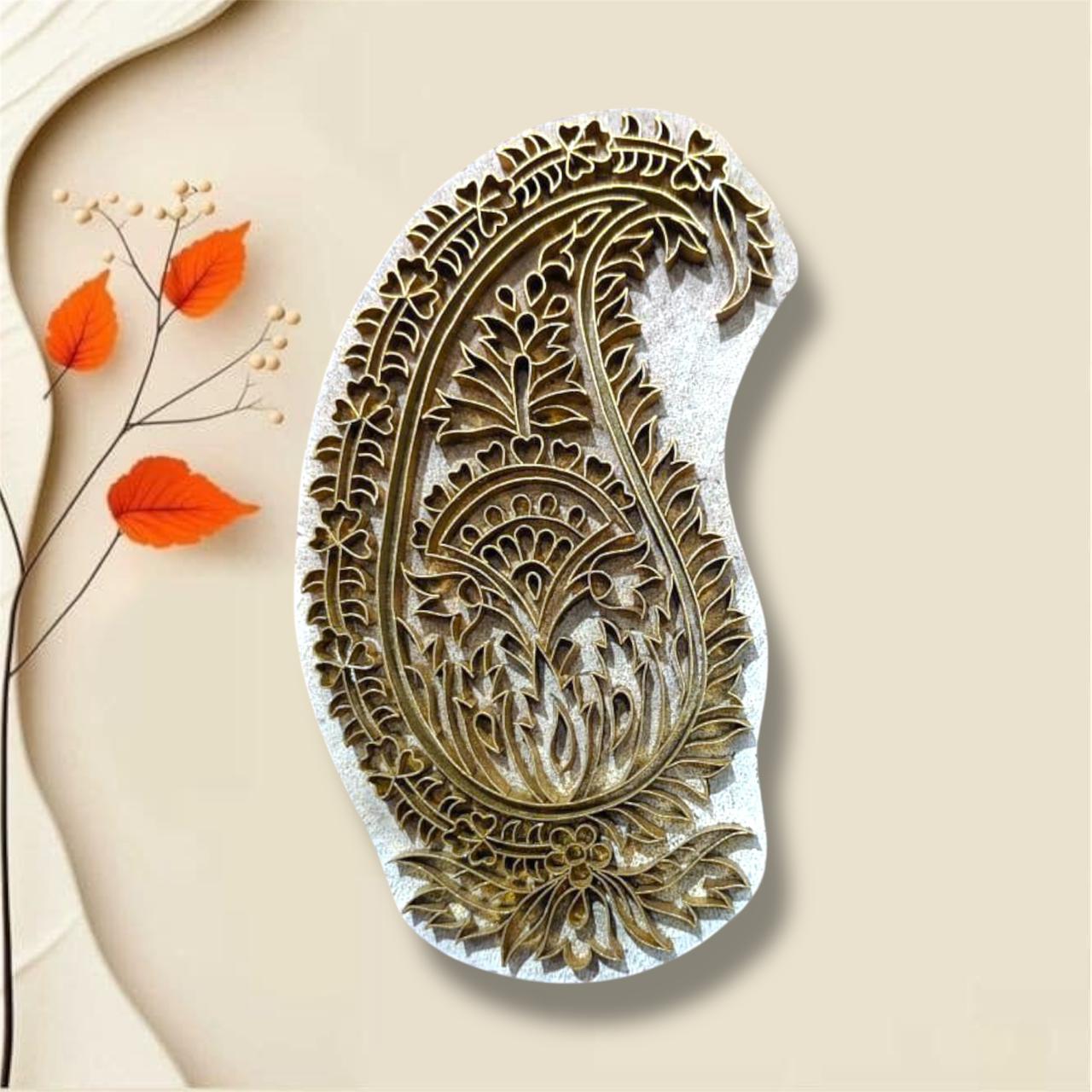 A Brass printing block stamp is a meticulously handcrafted tool, traditionally used in textile printing, pottery, or paper crafting